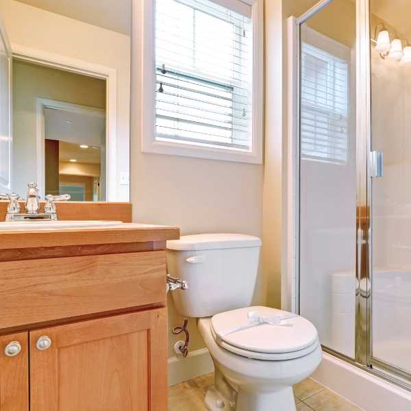 A bathroom with the window open