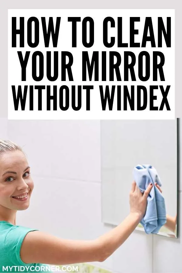 A lady cleaning a mirror with text that says, "How to clean your mirror without windex".