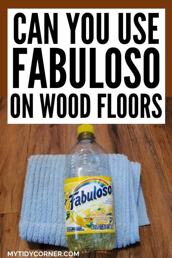  bottle of fabuloso on a towel on wood flooring with text that says, "Can you use fabuloso on wood floors".