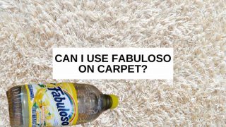 A bottle of Fabuloso on a carpet with text that says, 