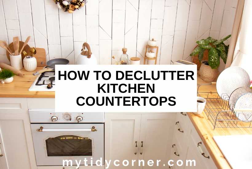 Plates, plant and other stuff on kitchen counter and text that says, "How to declutter kitchen countertops".