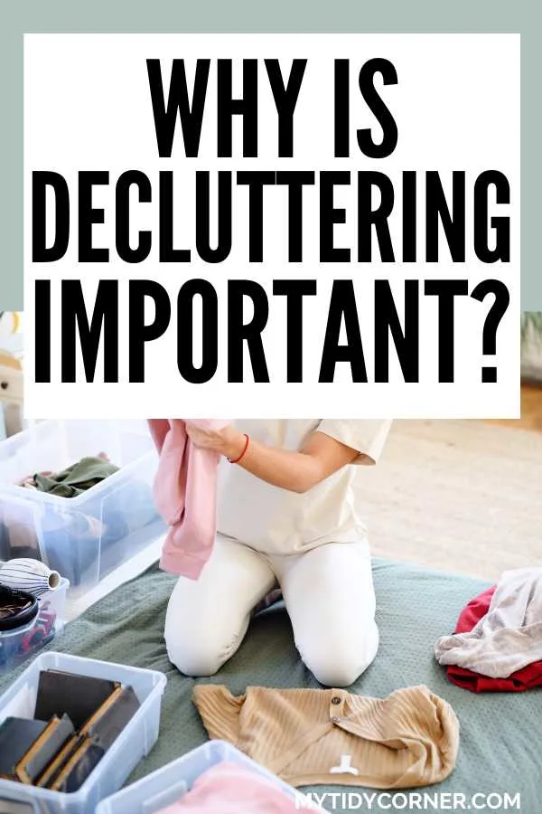 A woman holding a pink clothing, plastic bins and other items on the floor and text overlay that reads, "Why is decluttering important?"