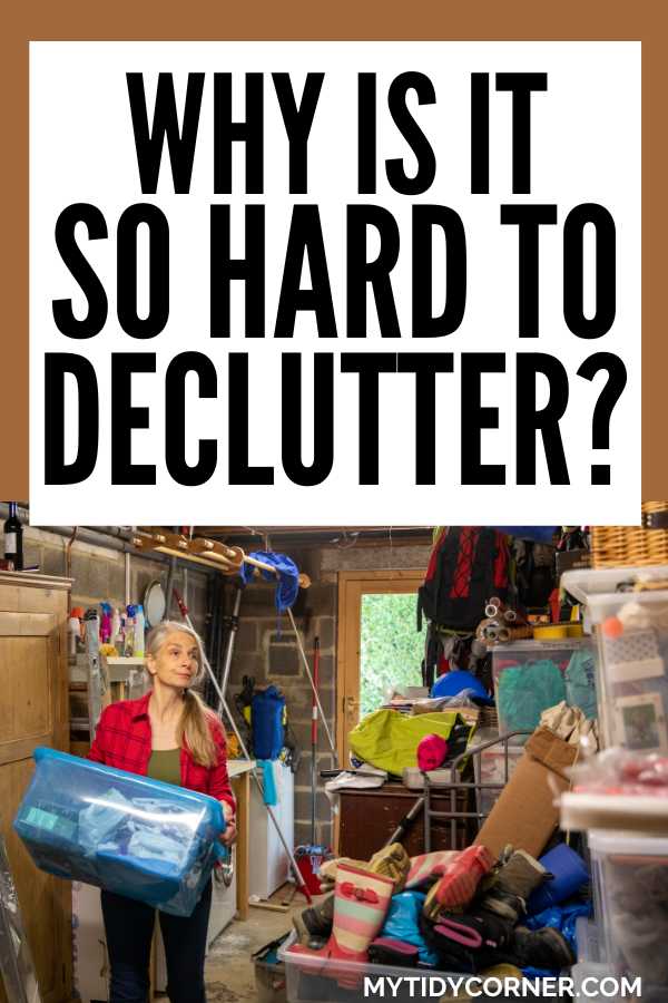 A Woman carrying a plastic bin filled with decluttered items in a garage and text overlay that reads, "Why is it so hard to declutter?"