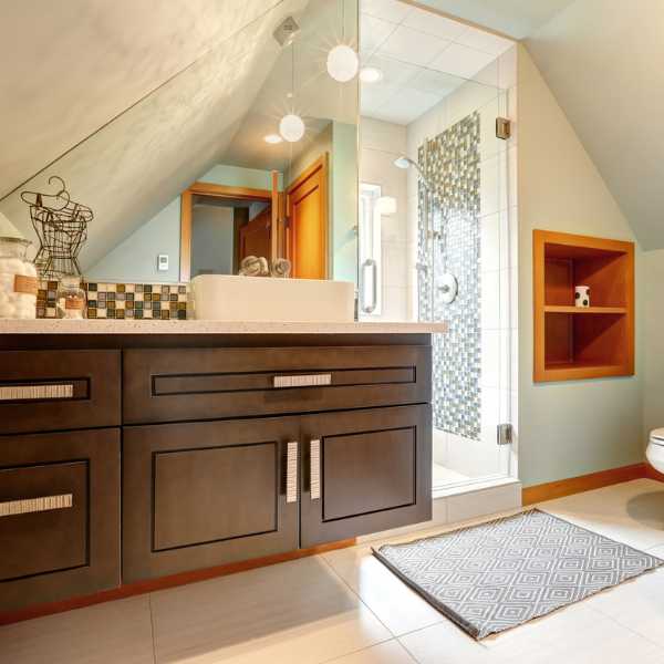 bathroom with slanted ceiling - same color as the walls