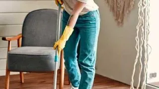A woman cleaning - Spring cleaning tips.