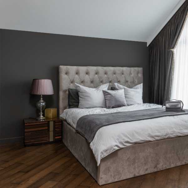 Bedroom with slate gray wall