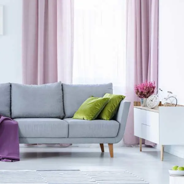 Room with lilac curtains.