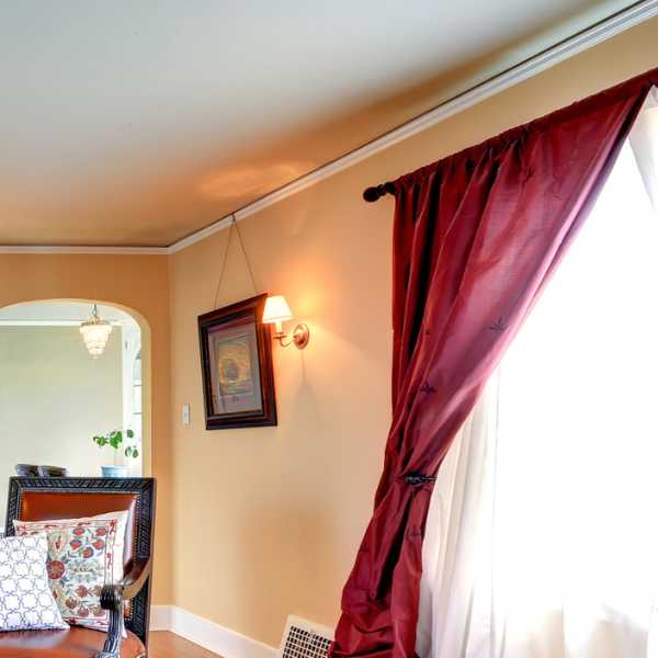 Room with red curtain.