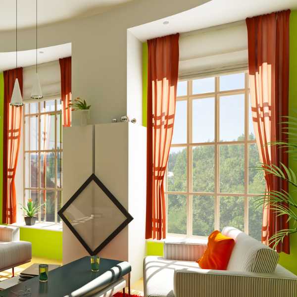 Living room with sill length curtains.