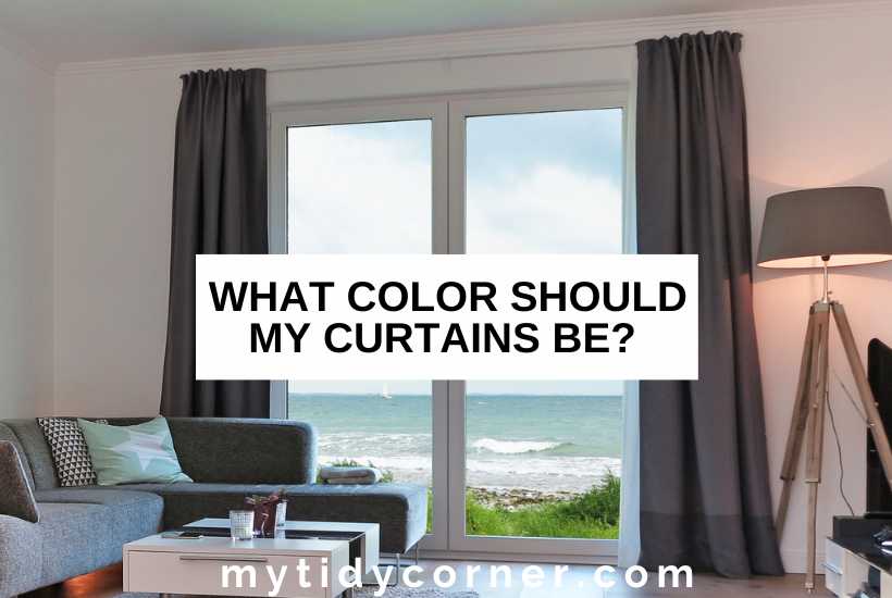 A modern living room and text overlay that reads, "What color should my curtains be?"