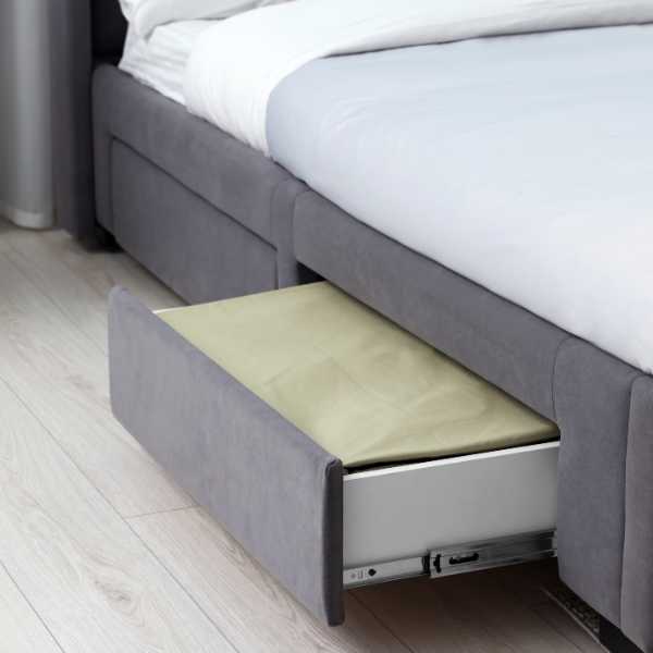 Bed with in built drawer.