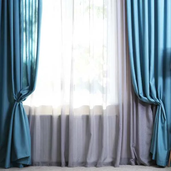 Blue floor length curtains.