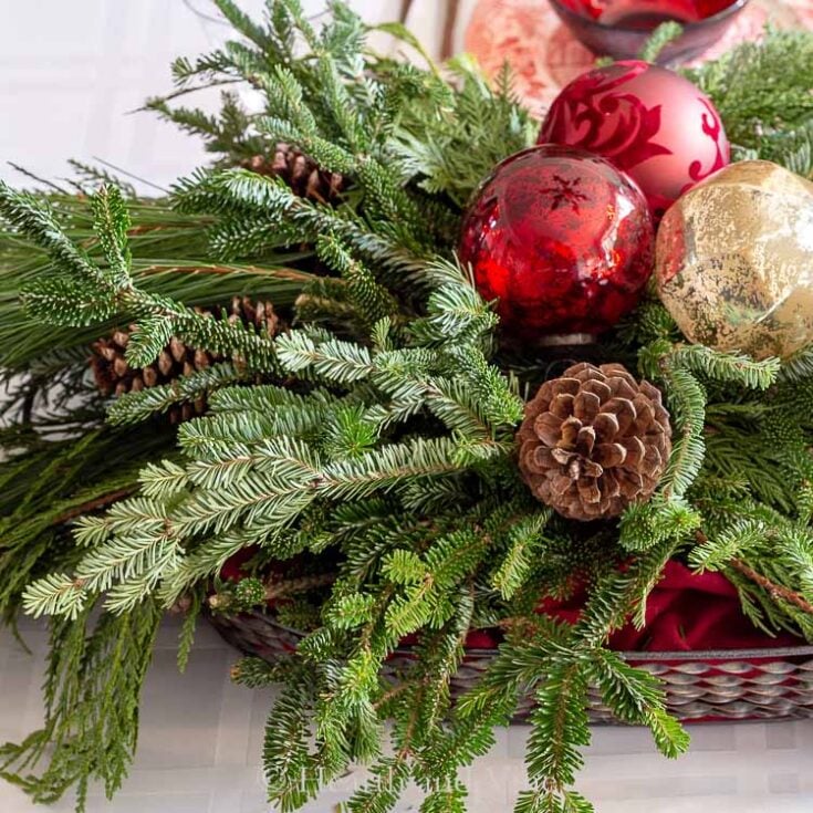 Image for Christmas Table Centerpiece Made with Evergreens and Ornaments