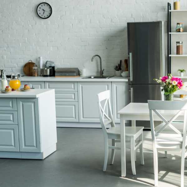 Modern kitchen with white wall.