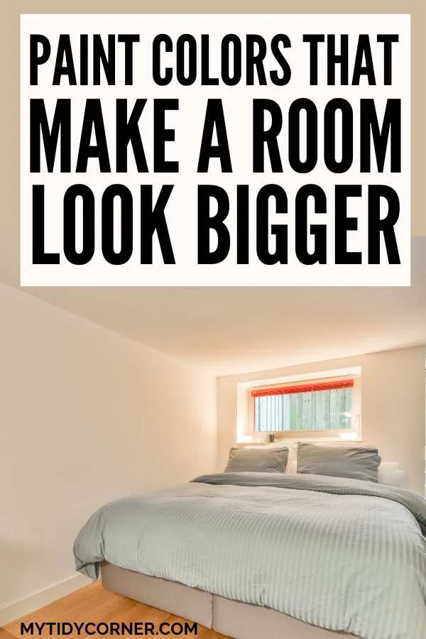Neutral bedroom and text overlay that reads, "Paint colors that make a room look bigger".