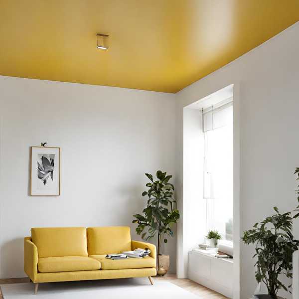 Room with white walls and yellow ceiling.