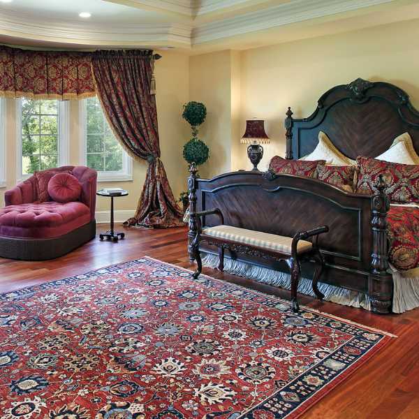 Luxury master bedroom with Turkish rug.