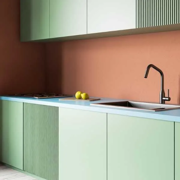 Terracotta and green kitchen.