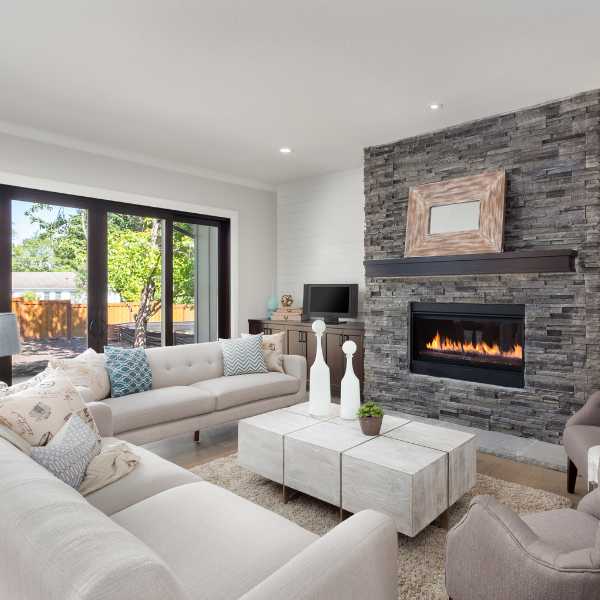 Modern living room with fireplace.