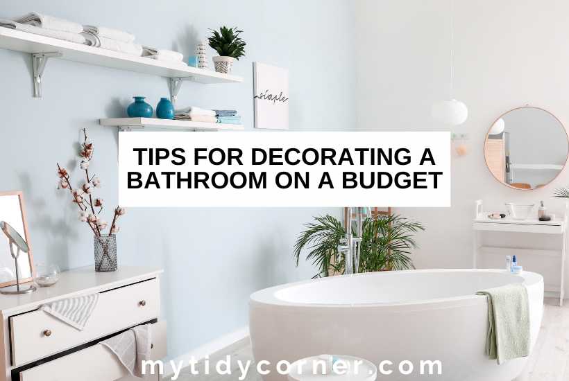 A classic bathroom and text overlay that reads, "Tips for decorating a bathroom on a budget".
