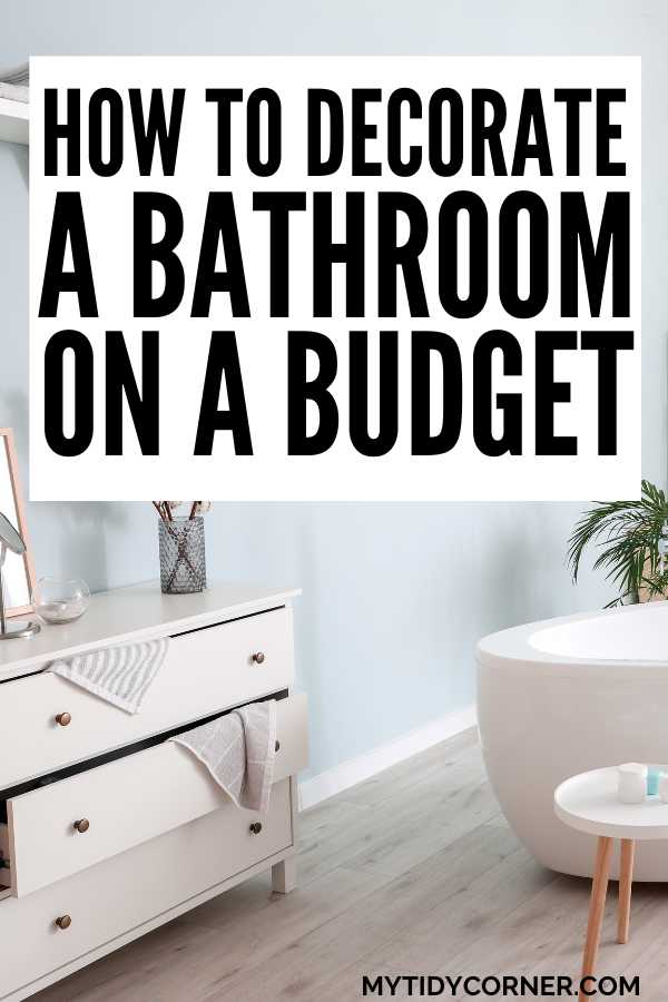 A modern bathroom and text overlay that reads, "How to decorate a bathroom on a budget".