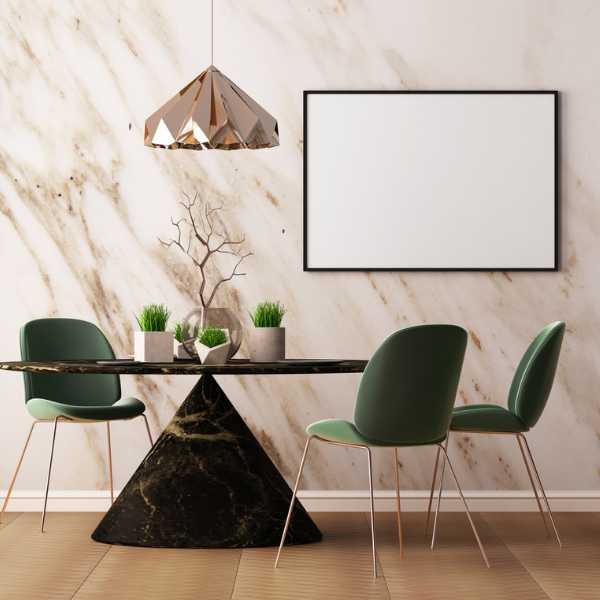Modern dining room with green chairs and copper light fixture.