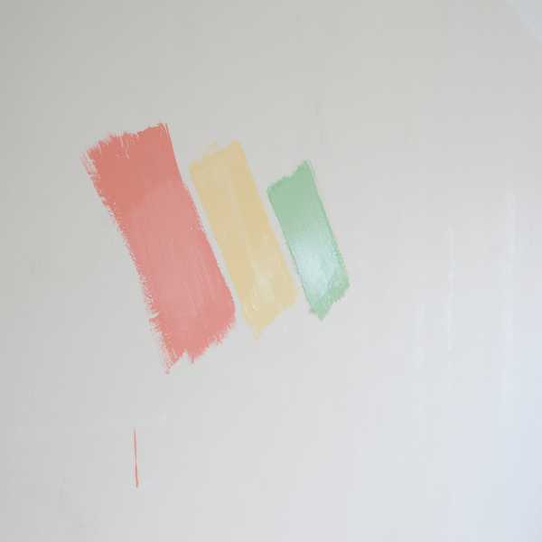 Paint color samples on a wall.