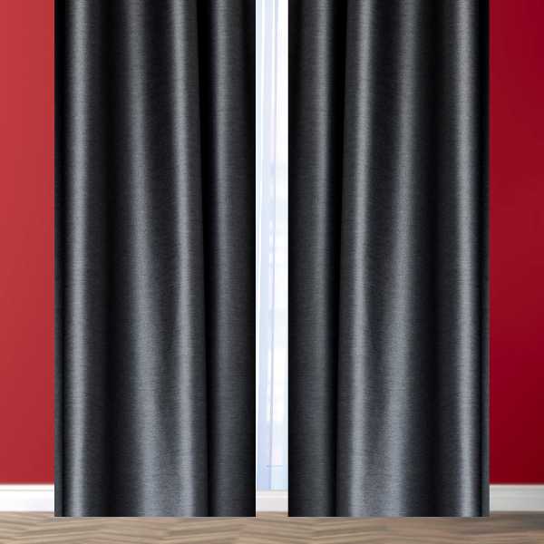 Black curtains against red wall.