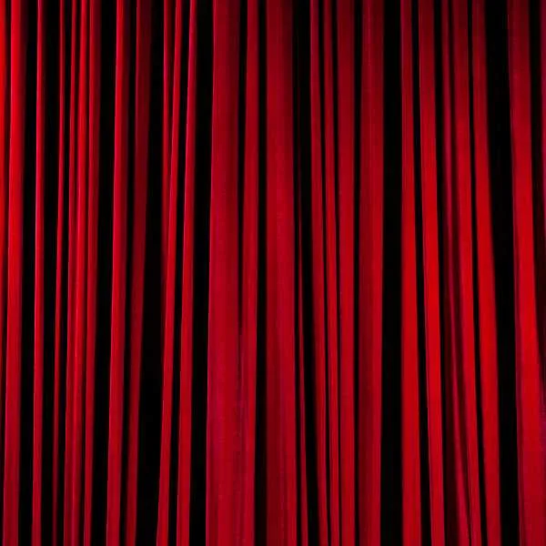 Brick red curtain.