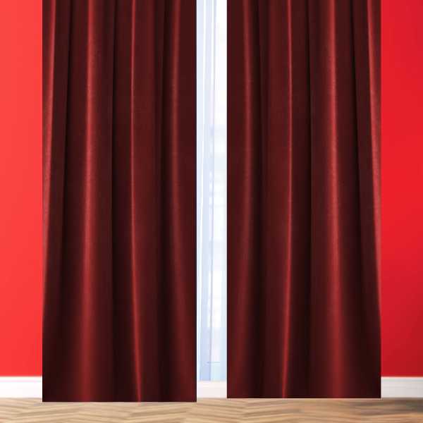 Dark red curtains on vibrant red wall.