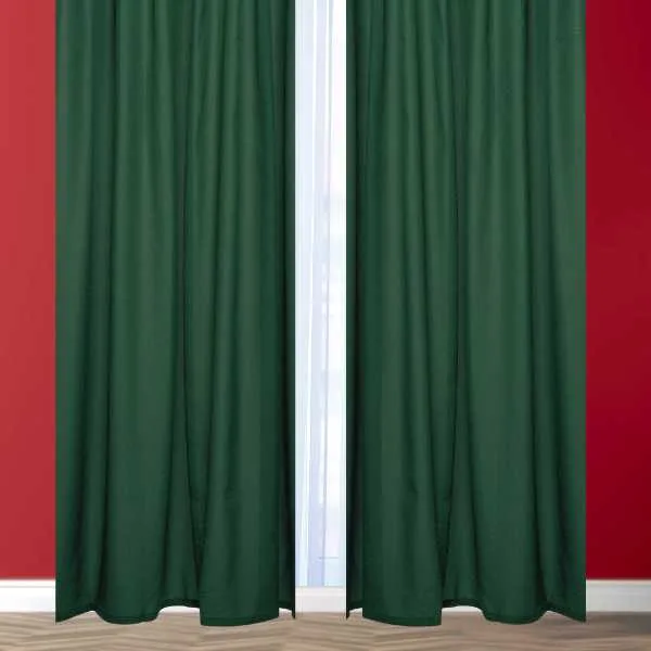 Green curtains on red wall.