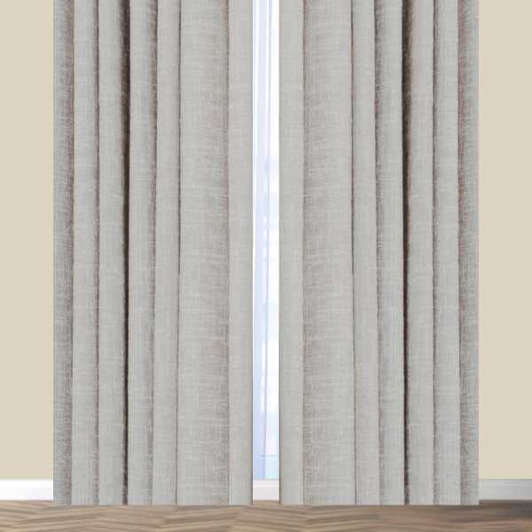 Off white curtains on tan wall.