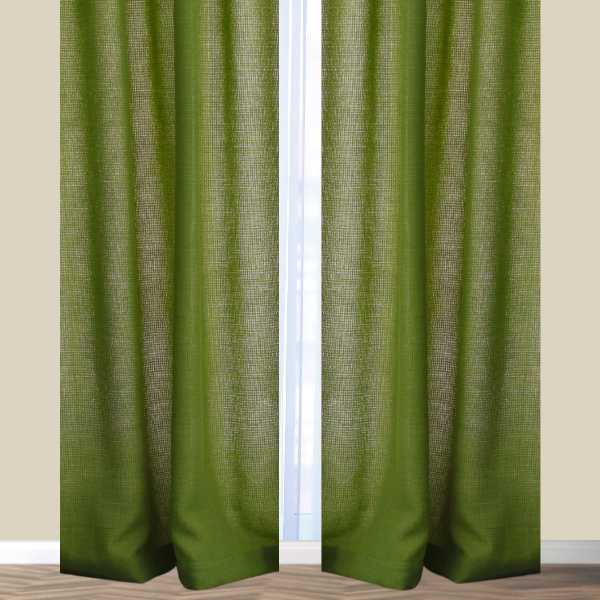 Olive green curtains on tan wall.