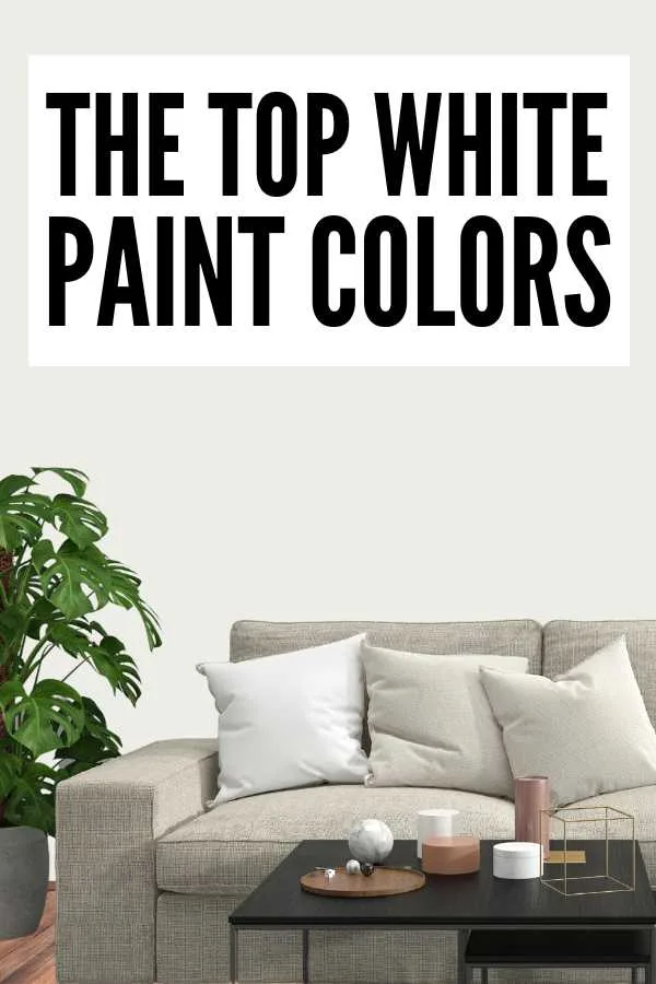 White wall background, wood floor, potted plant, throw pillows on a couch, coffee table, and text overlay that says, "The top white paint colors".