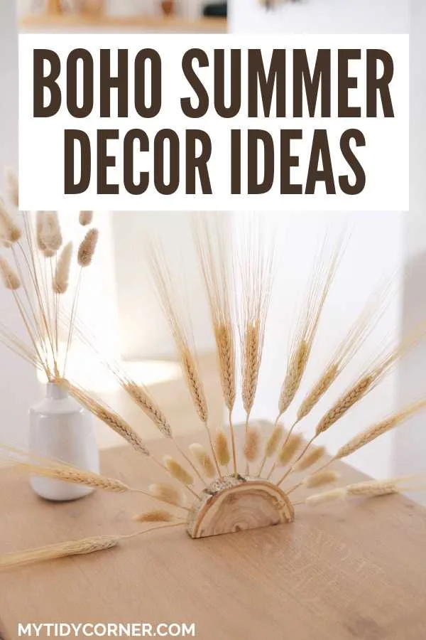 Love boho style? Get inspired by these boho summer decor ideas to create a chic and cozy space! Brighten your space with these boho summer decorating ideas. You will love these bohemian summer decor ideas. Sun ray decor piece, dried flowers in a vase and text overlay that reads, "Boho summer decor ideas".