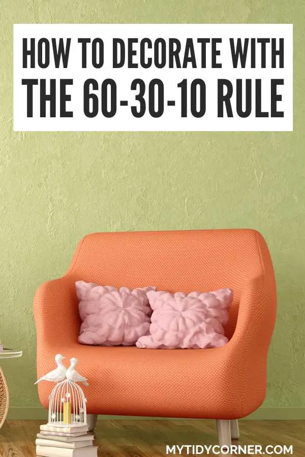 Pink throw pillows on an orange chair, green wall and text overlay that says, "How to decorate with the 60-30-10 rule".