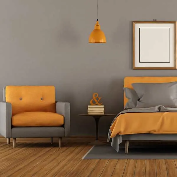 Gray and orange bedroom.