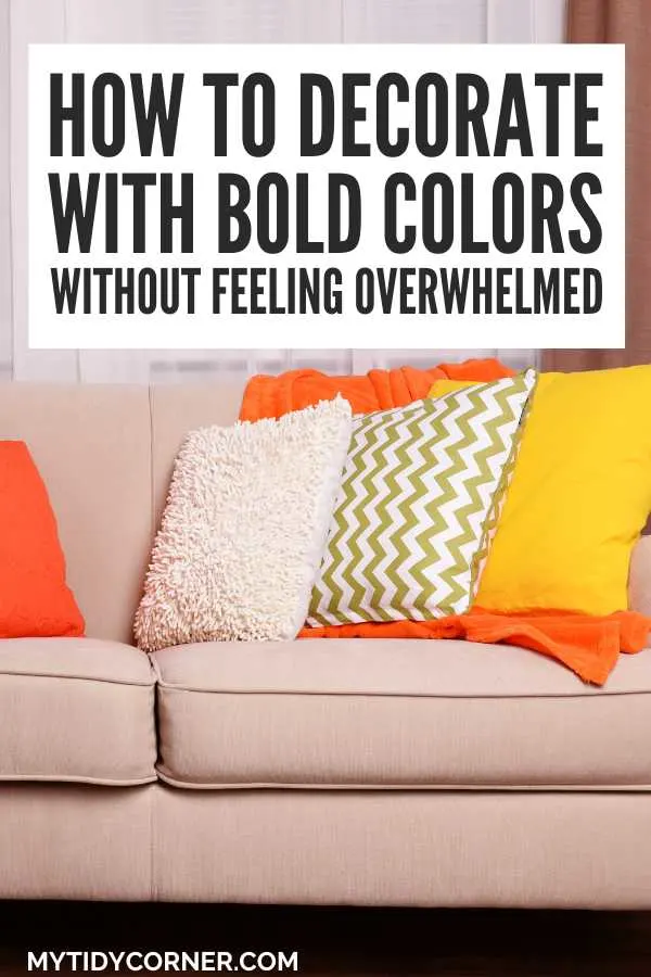 Colorful throw pillows on a beige couch and text overlay that says, "How to decorate with bold colors without feeling overwhelmed".