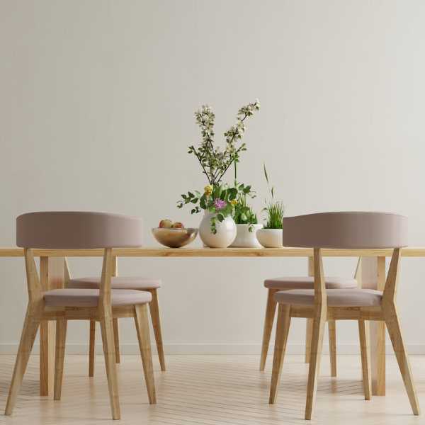 Plants and fruits on a dining table.