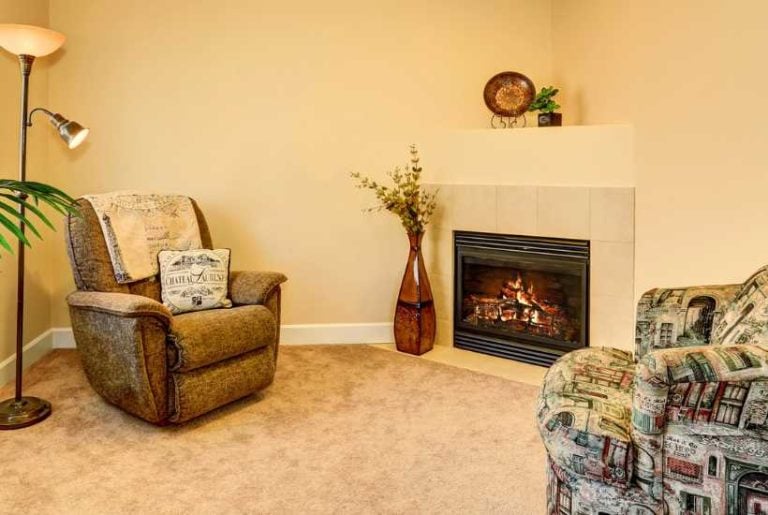 A living room with yellow walls - Featured image for "Paint colors for low light rooms" blog post.